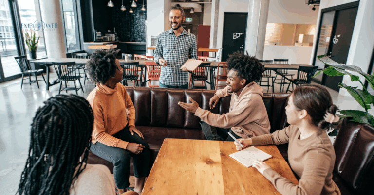 Group of people discussing recovery referral programs at Empower Health Group