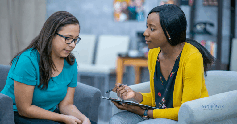 Therapist guiding client through DBT therapy session at Empower Health Group
